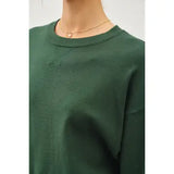 Solid Round Neck Relaxed Sweater in Hunter Green